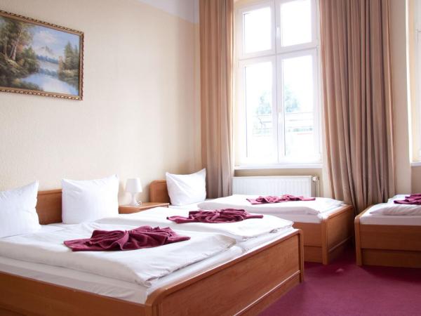 Hotel AI Königshof : photo 10 de la chambre chambre quadruple