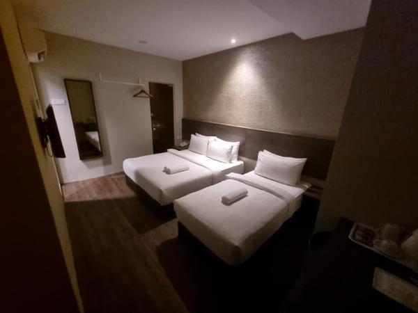 MIICO Hotel @ Mount Austin : photo 1 de la chambre family room (queen + single)