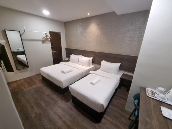 MIICO Hotel @ Mount Austin : photo 3 de la chambre family room (queen + single)