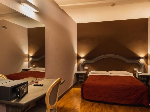 Hotel Unicorno : photo 1 de la chambre chambre triple