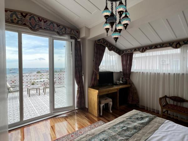 Ersari Hotel : photo 7 de la chambre chambre lune de miel deluxe avec terrasse - vue sur mer