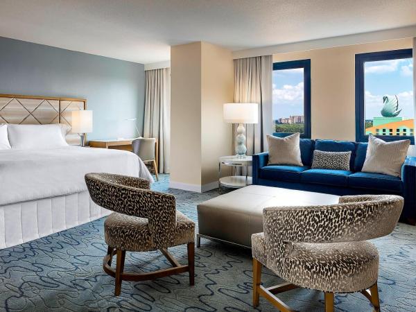 Walt Disney World Dolphin : photo 2 de la chambre suite junior lit king-size deluxe avec alcôve et canapé-lit - entrée anticipée aux parcs à thèmes disney incluse