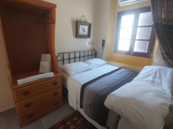 Ryad 91 : photo 1 de la chambre chambre simple standard avec douche