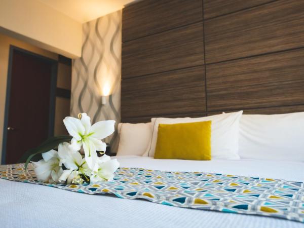 Hotel Expo Abastos : photo 6 de la chambre chambre lit queen-size 