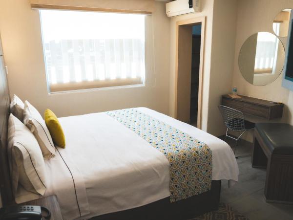 Hotel Expo Abastos : photo 7 de la chambre chambre lit queen-size 