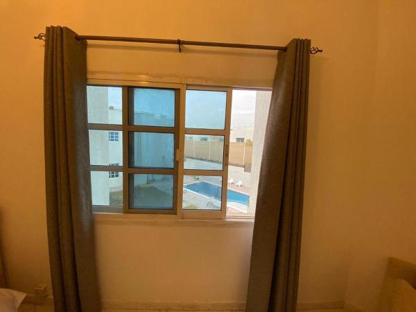 Comfortable Private Rooms in Compound Housing : photo 6 de la chambre chambre double avec salle de bains privative