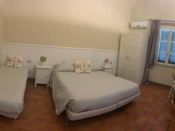 Relais Le Ortensie : photo 4 de la chambre chambre double ou lits jumeaux - vue sur jardin