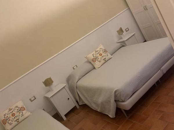 Relais Le Ortensie : photo 6 de la chambre chambre double ou lits jumeaux - vue sur jardin