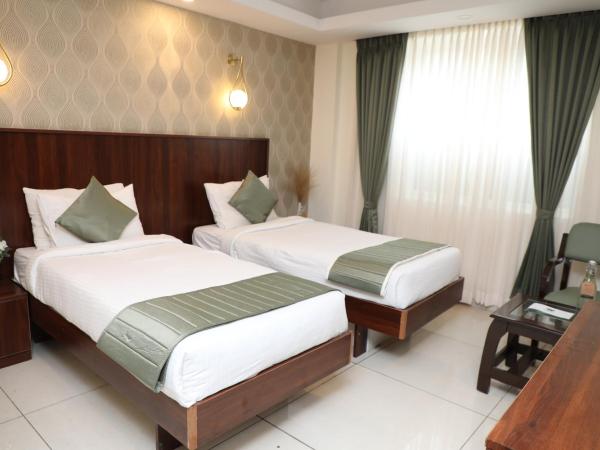 Earth Hotels : photo 6 de la chambre chambre lits jumeaux avec salle de bains