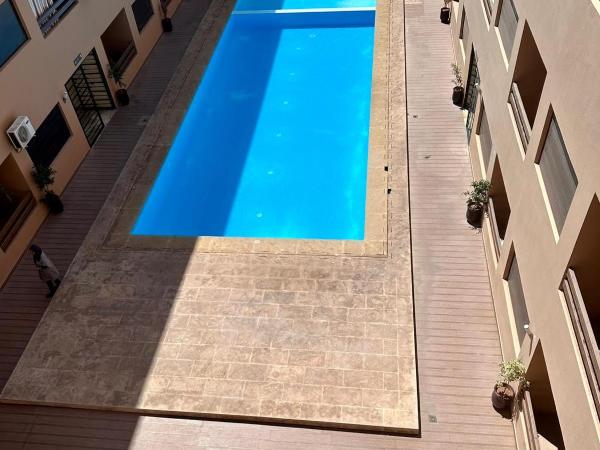 Ennour HOME PISCINE : photo 9 de la chambre appartement - vue sur piscine