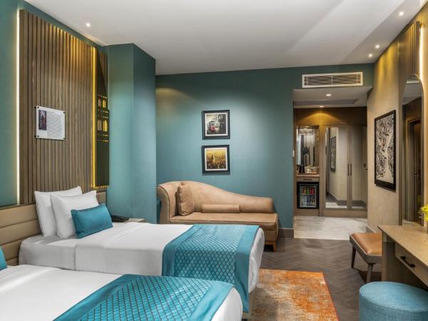 Aspera Hotel Altunizade : photo 2 de la chambre chambre lits jumeaux deluxe avec vue sur le jardin