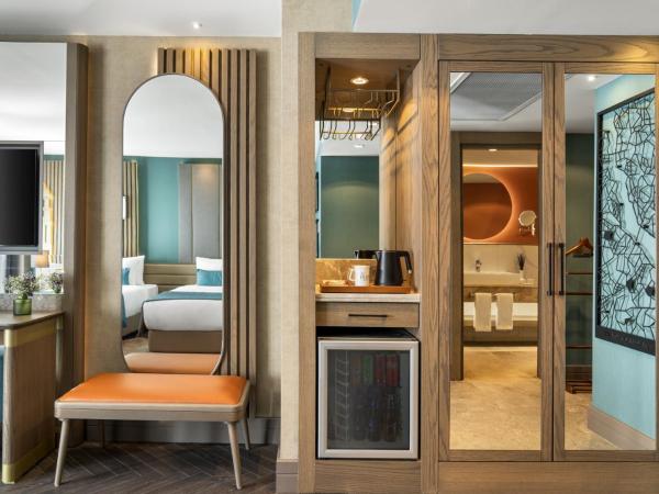 Aspera Hotel Altunizade : photo 3 de la chambre chambre lits jumeaux deluxe avec vue sur le jardin