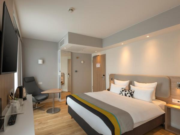 Holiday Inn Express Munich - City East, an IHG Hotel : photo 4 de la chambre chambre standard lit queen-size
