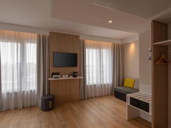 Holiday Inn Express Munich - City East, an IHG Hotel : photo 2 de la chambre chambre lit queen-size avec canapé-lit
