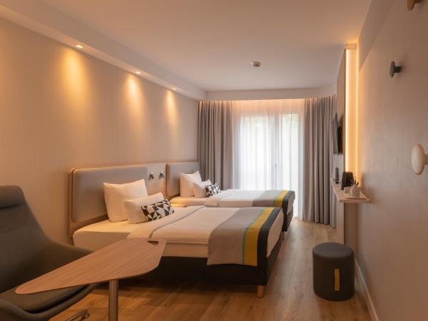 Holiday Inn Express Munich - City East, an IHG Hotel : photo 1 de la chambre chambre supérieure lits jumeaux