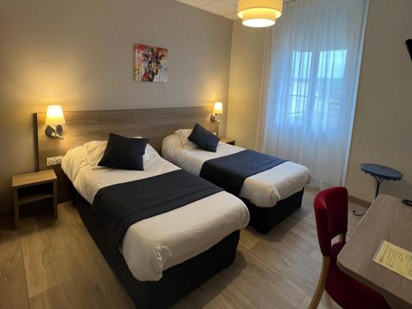 Hôtel Le Roi Gourmand : photo 2 de la chambre chambre lits jumeaux