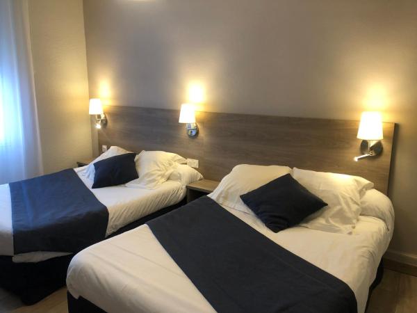 Hôtel Le Roi Gourmand : photo 2 de la chambre chambre triple