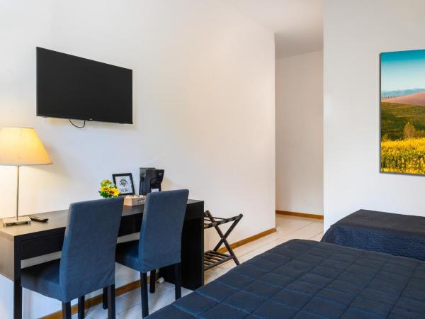 Hotel Anna Siena Nord : photo 3 de la chambre chambre triple