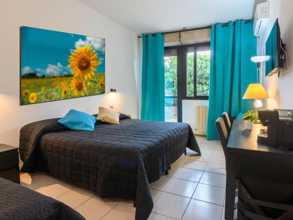 Hotel Anna Siena Nord : photo 4 de la chambre chambre triple