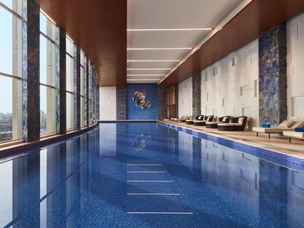 Sheraton Beijing Lize Hotel : photo 1 de la chambre chambre 2 lits doubles deluxe - vue sur ville