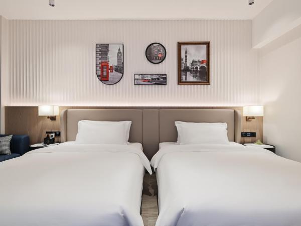 Livetour Hotel Luogang Science City Guangzhou : photo 3 de la chambre chambre lits jumeaux deluxe