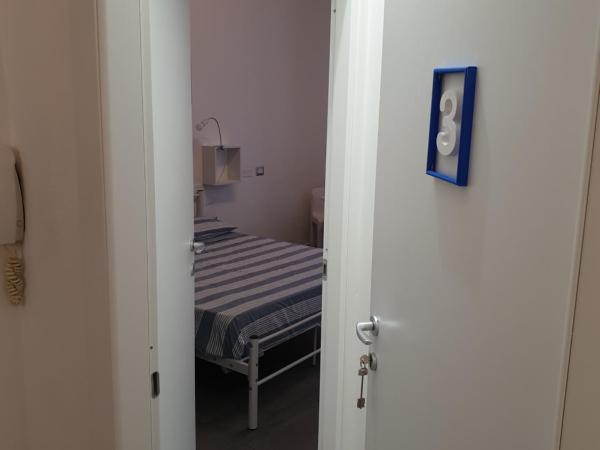 Da Laura : photo 9 de la chambre chambre deluxe (2 adultes + 1 enfant)