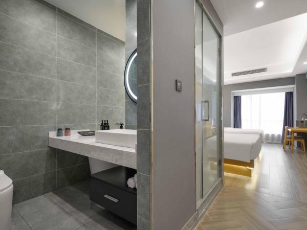 Weiming Hotel : photo 6 de la chambre yuexin twin room