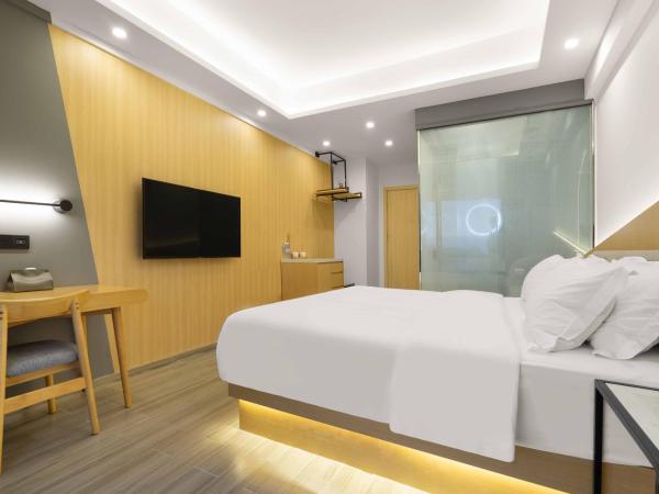 Weiming Hotel : photo 3 de la chambre amber king room