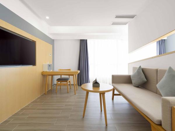 Weiming Hotel : photo 2 de la chambre suite deluxe