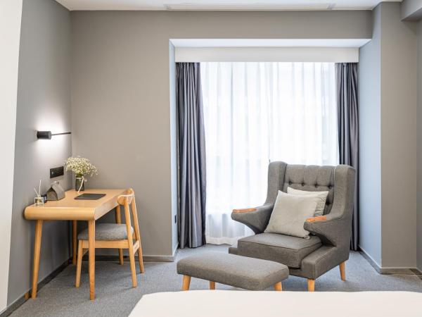 Weiming Hotel : photo 4 de la chambre yuexin king room