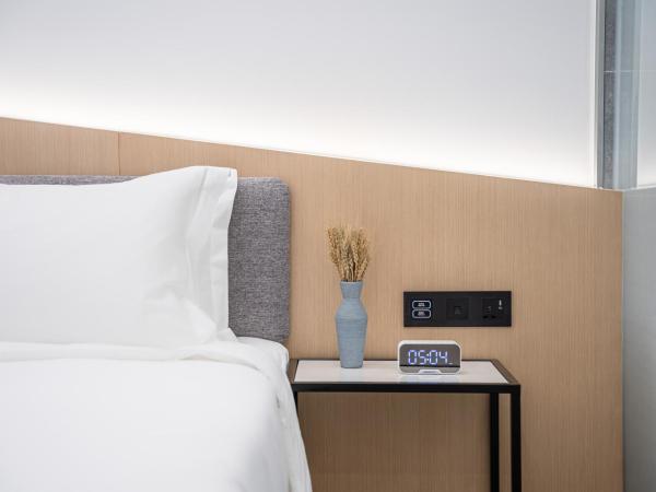 Weiming Hotel : photo 8 de la chambre yuexin king room