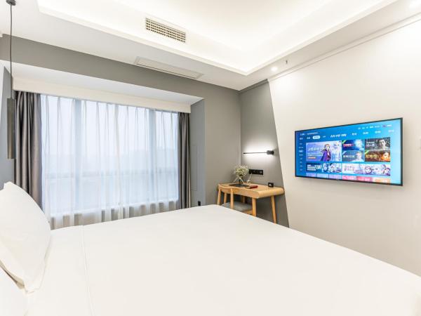 Weiming Hotel : photo 6 de la chambre amber king room