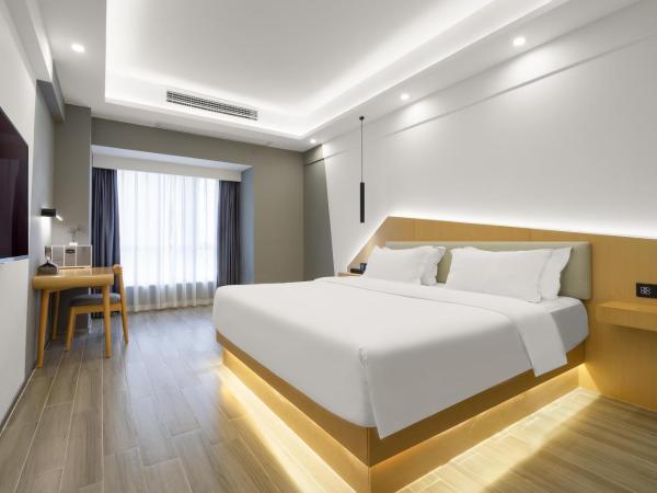 Weiming Hotel : photo 2 de la chambre fanjing king room