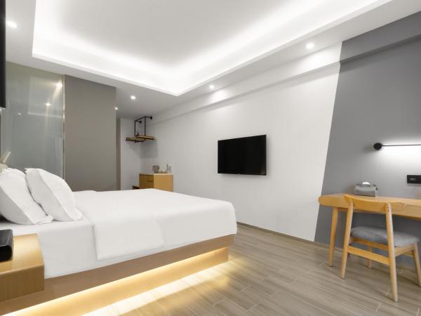 Weiming Hotel : photo 4 de la chambre fanjing king room