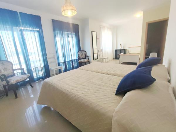 PKSC Surf House : photo 1 de la chambre chambre triple supérieure