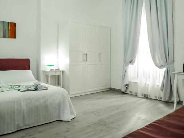 Etna Suite Group : photo 3 de la chambre chambre triple