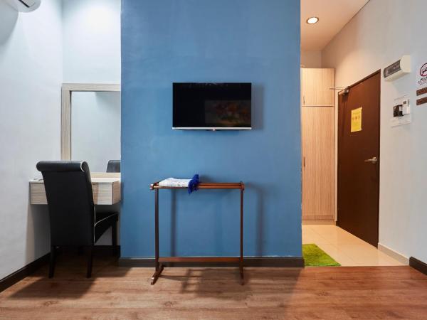 D' Qamar Guesthouse : photo 1 de la chambre chambre lits jumeaux