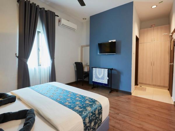 D' Qamar Guesthouse : photo 1 de la chambre chambre double