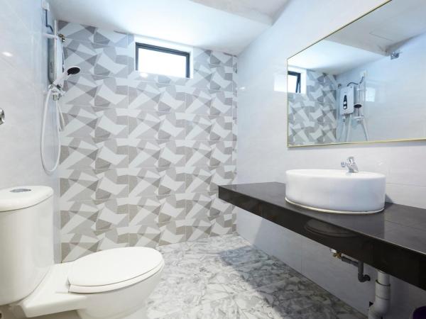 D' Qamar Guesthouse : photo 3 de la chambre chambre familiale