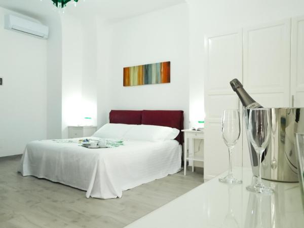 Etna Suite Group : photo 1 de la chambre chambre triple