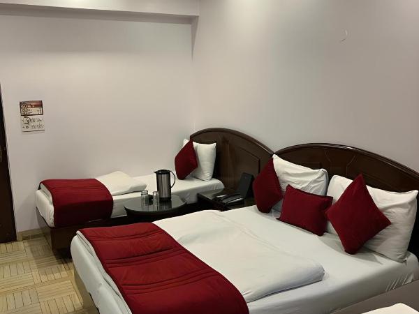 Hotel Sun International : photo 3 de la chambre chambre triple confort