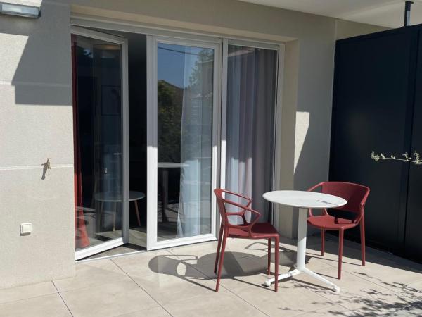DOMITYS LES TOURMALINES : photo 1 de la chambre chambre triple avec terrasse