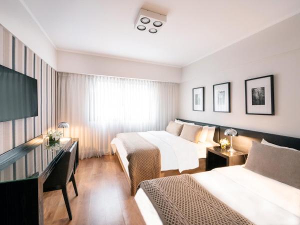 Principado Downtown : photo 3 de la chambre chambre triple