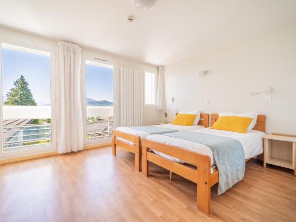 Centre Jean XXIII : photo 5 de la chambre chambre lits jumeaux - vue sur lac