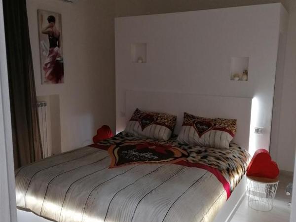Maison Rinaldi SrL : photo 2 de la chambre chambre lit king-size avec balcon