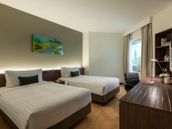 Oakwood Hotel and Residence Kuala Lumpur : photo 1 de la chambre chambre lits jumeaux deluxe