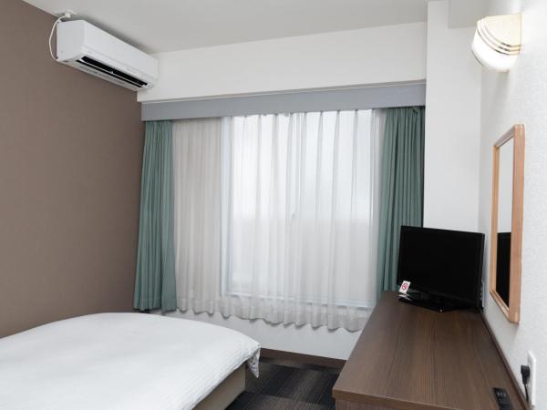 Heiwadai Hotel Tenjin : photo 5 de la chambre chambre double avec petit lit double - fumeurs