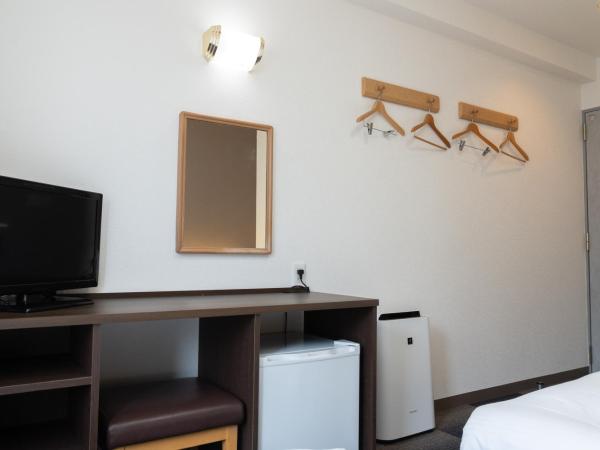 Heiwadai Hotel Tenjin : photo 3 de la chambre chambre lits jumeaux - fumeurs