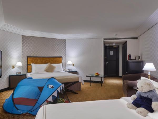 Grand Millennium Kuala Lumpur : photo 3 de la chambre chambre familiale avec lit king-size et lit simple