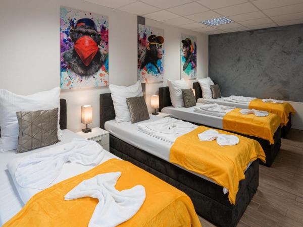 Cannstatter Hotel : photo 8 de la chambre chambre quadruple - vue sur jardin